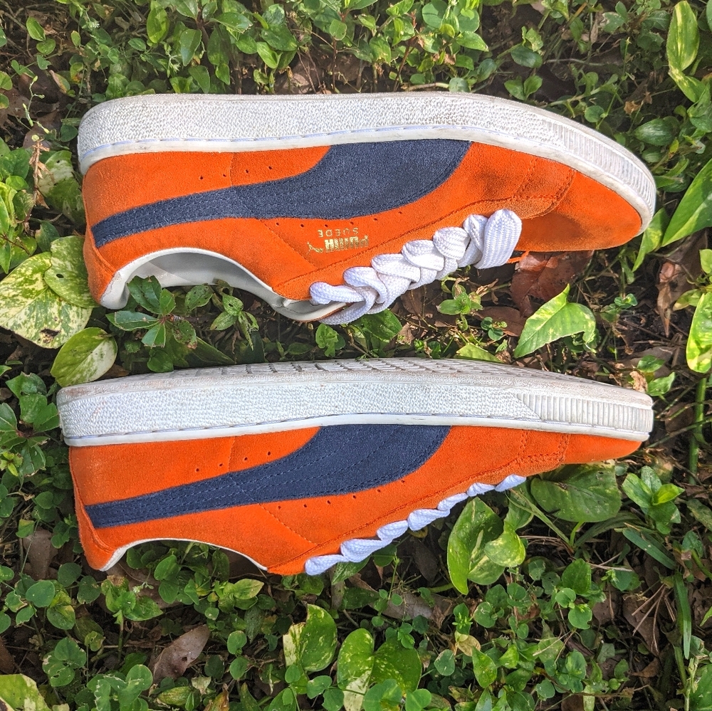 Orange and Navy blue Puma's.